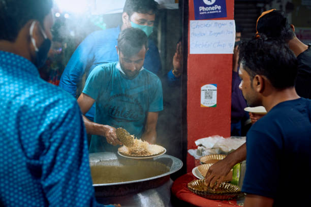 people eating biryani